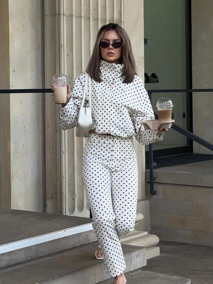 Women's polka dot cropped jacket with high neckline and long sleeves