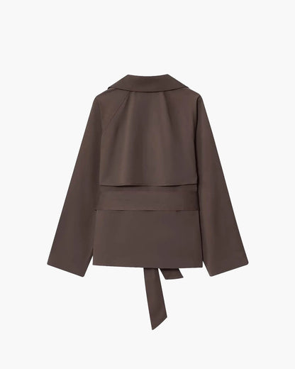 Women's short belted trench coat with wide lapels and long sleeves
