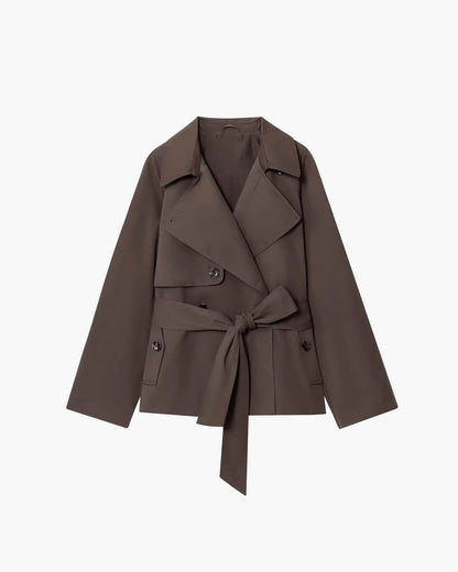 Women's short belted trench coat with wide lapels and long sleeves