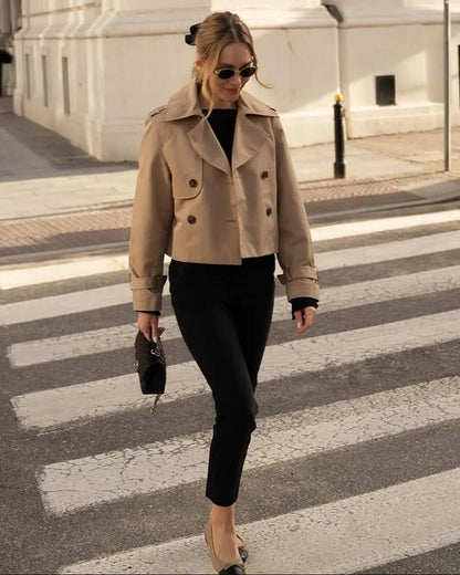 Women's cropped double-breasted trench coat with notched lapels and long sleeves