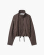 Women's polka dot cropped jacket with high neckline and long sleeves