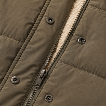 Women's long quilted hooded puffer coat shown in olive and navy