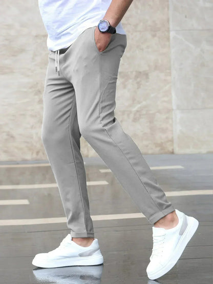 Men's casual tapered trousers with drawstring waist and side pockets