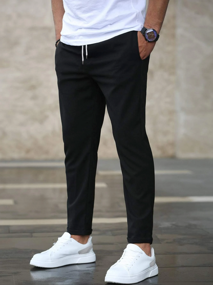 Men's casual tapered trousers with drawstring waist and side pockets