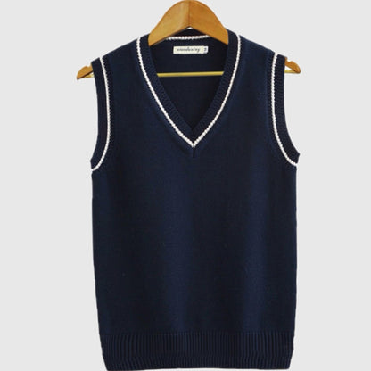 Women's sleeveless cable knit sweater vest with V-neck and ribbed contrast trim
