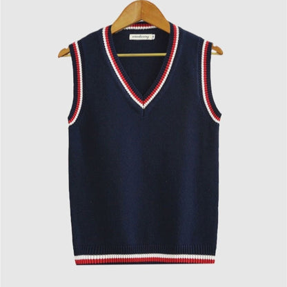 Women's sleeveless cable knit sweater vest with V-neck and ribbed contrast trim