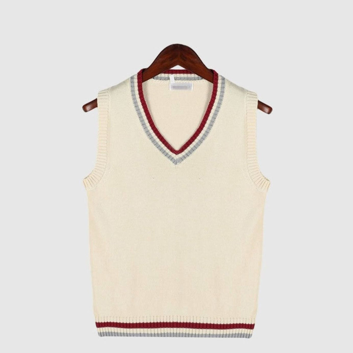 Women's sleeveless cable knit sweater vest with V-neck and ribbed contrast trim