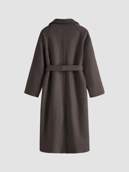 Women's long solid wrap coat with wide lapels and tie belt