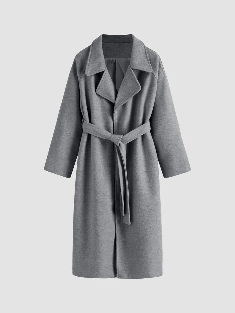 Women's long solid wrap coat with wide lapels and tie belt