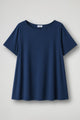 Women's cream short sleeve relaxed fit t-shirt with crew neckline displayed flat and on model