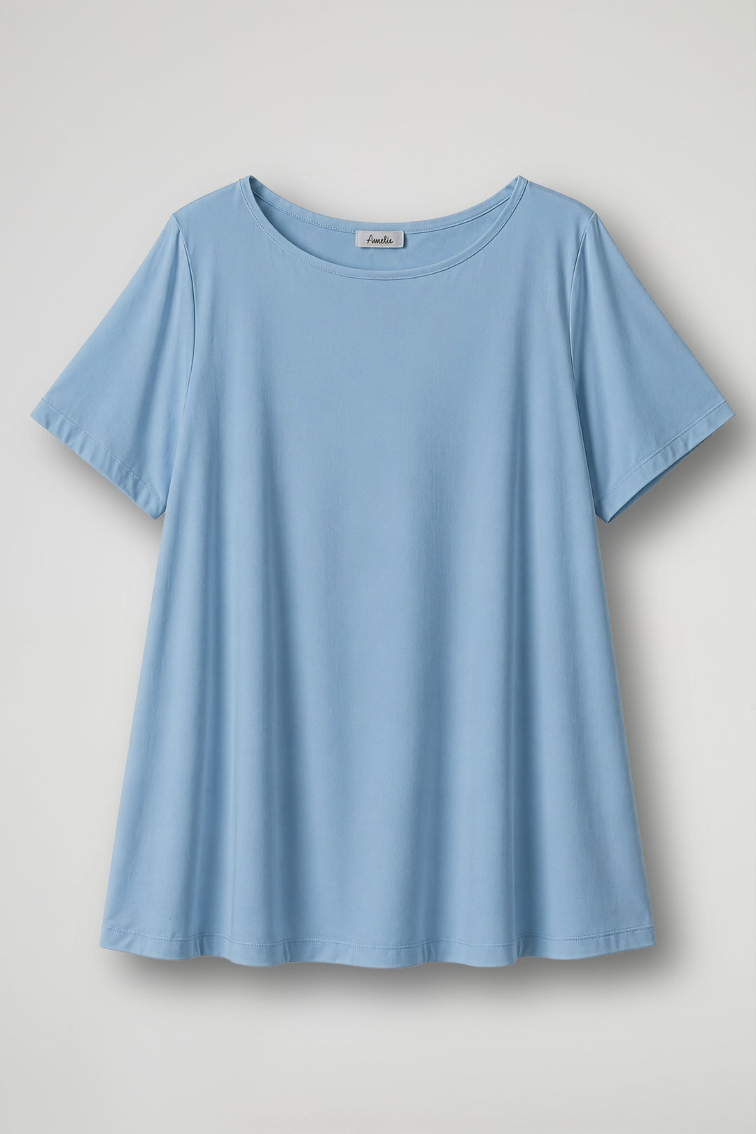 Women's cream short sleeve relaxed fit t-shirt with crew neckline displayed flat and on model