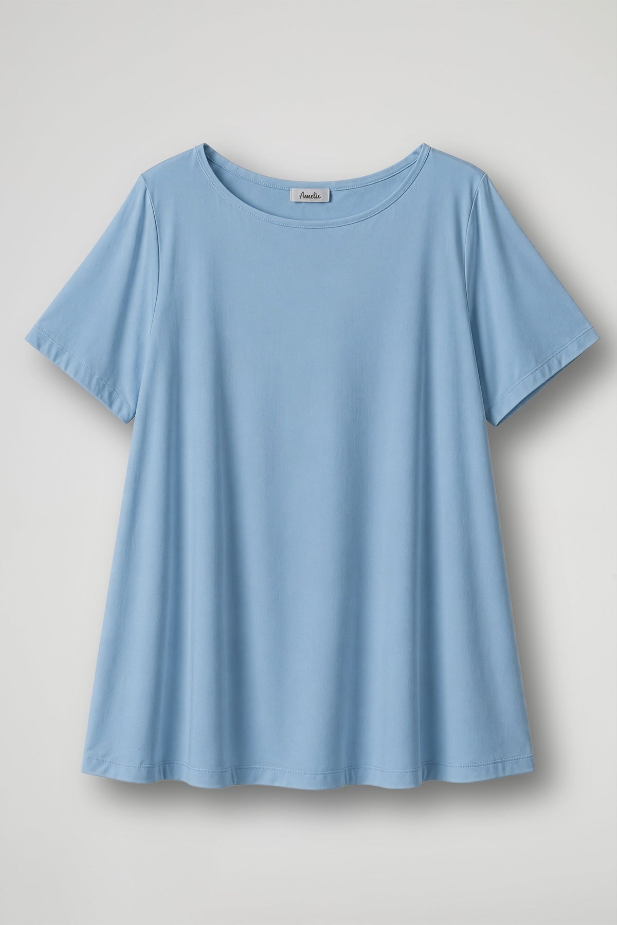 Women's cream short sleeve relaxed fit t-shirt with crew neckline displayed flat and on model