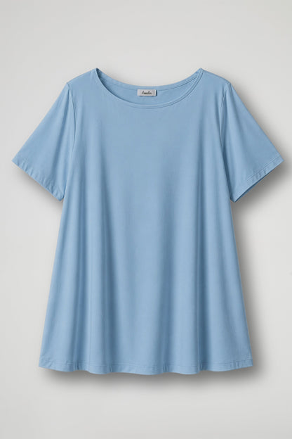 Women's cream short sleeve relaxed fit t-shirt with crew neckline displayed flat and on model