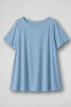 Women's cream short sleeve relaxed fit t-shirt with crew neckline displayed flat and on model