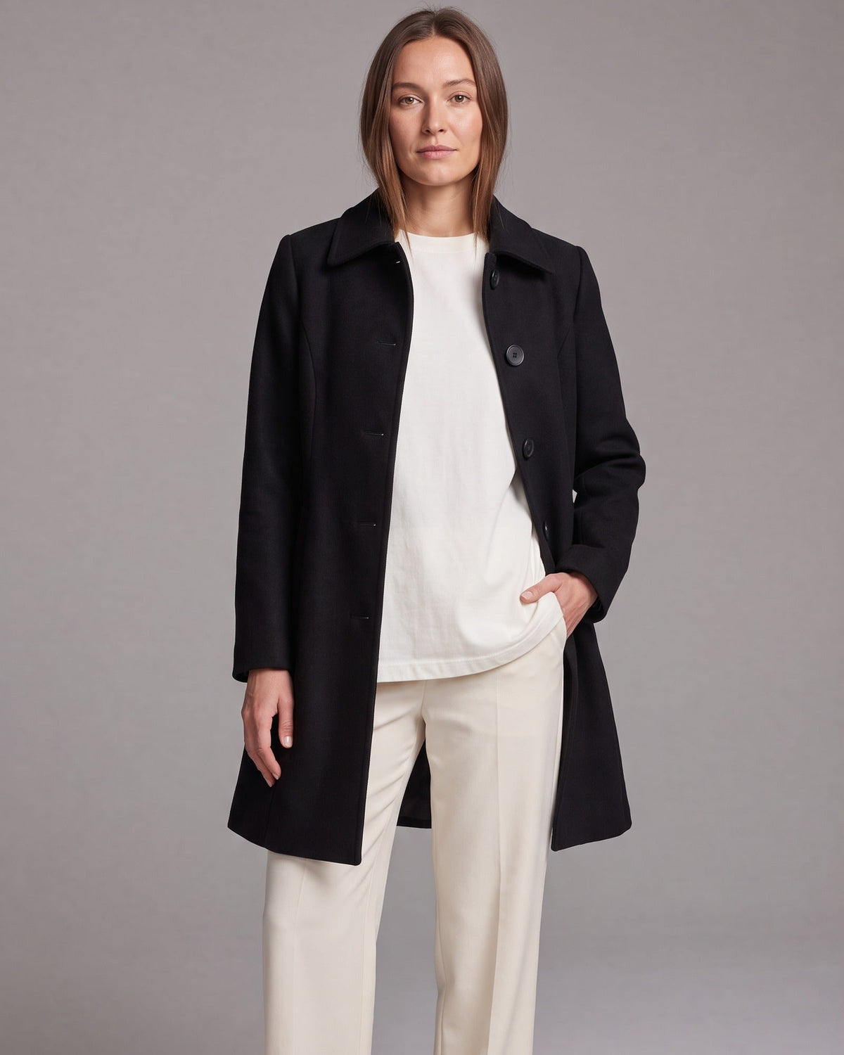 Women's fit and flare trench coat with pointed collar and button front