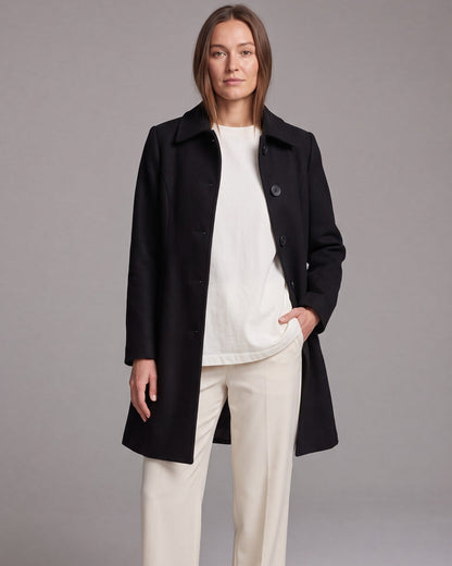 Women's fit and flare trench coat with pointed collar and button front