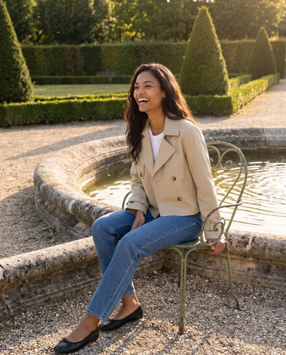 Women's beige cropped double-breasted trench jacket with lapels and cuff straps