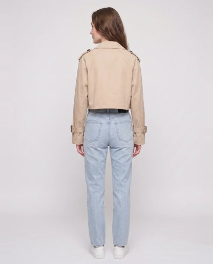 Women's beige cropped trench jacket with buckled belt and long sleeves