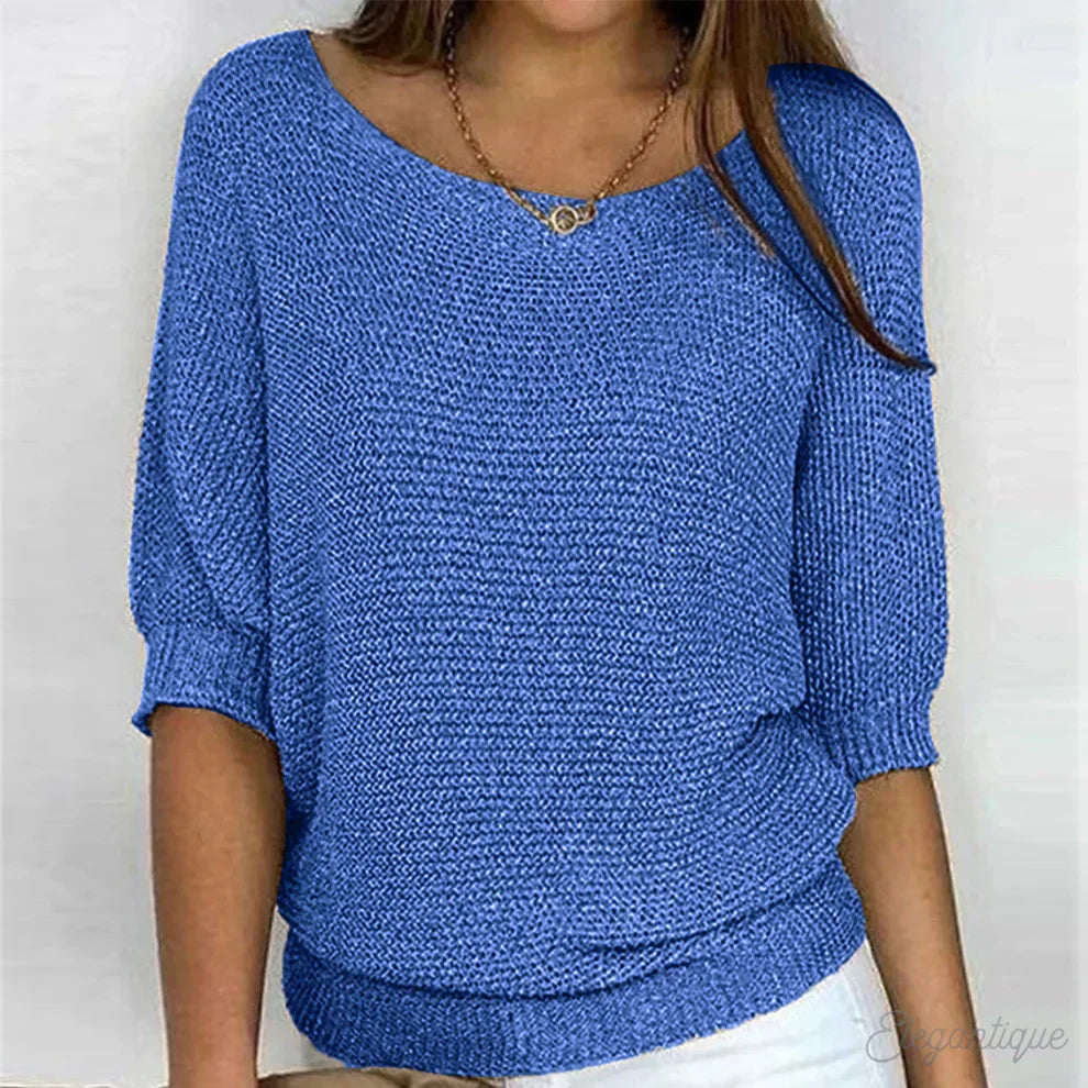 Women's textured knit sweater with wide round neck and three-quarter sleeves