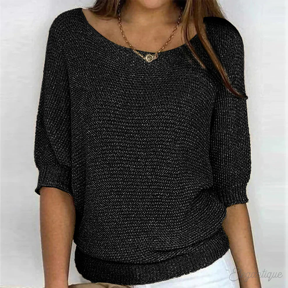 Women's textured knit sweater with wide round neck and three-quarter sleeves