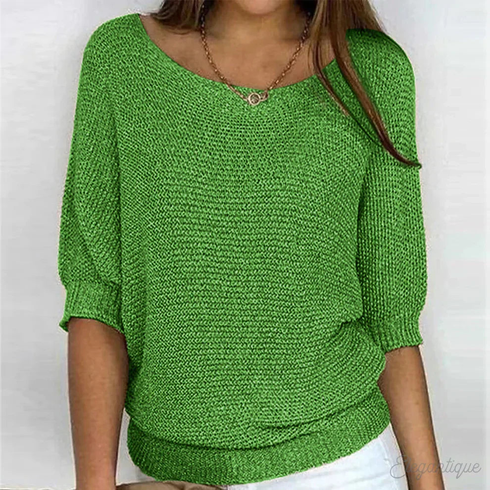 Women's textured knit sweater with wide round neck and three-quarter sleeves
