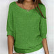 Women's textured knit sweater with wide round neck and three-quarter sleeves