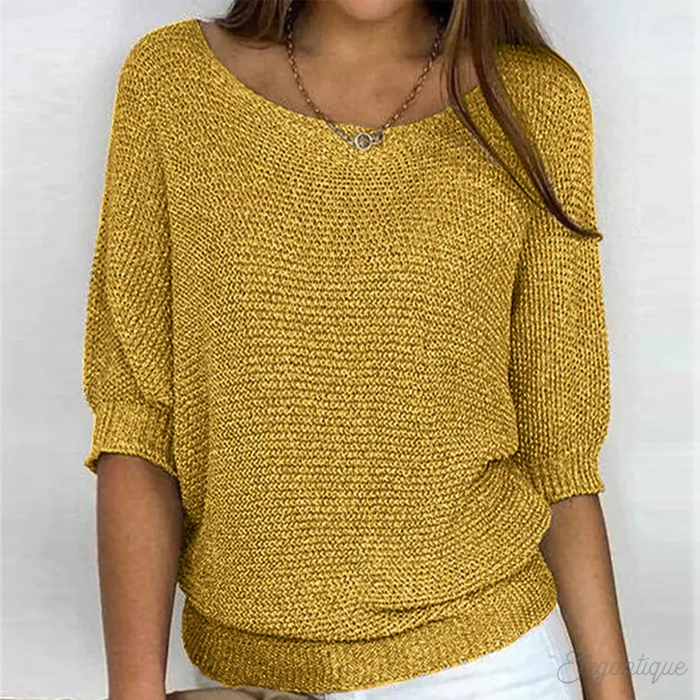 Women's textured knit sweater with wide round neck and three-quarter sleeves