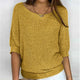 Women's textured knit sweater with wide round neck and three-quarter sleeves