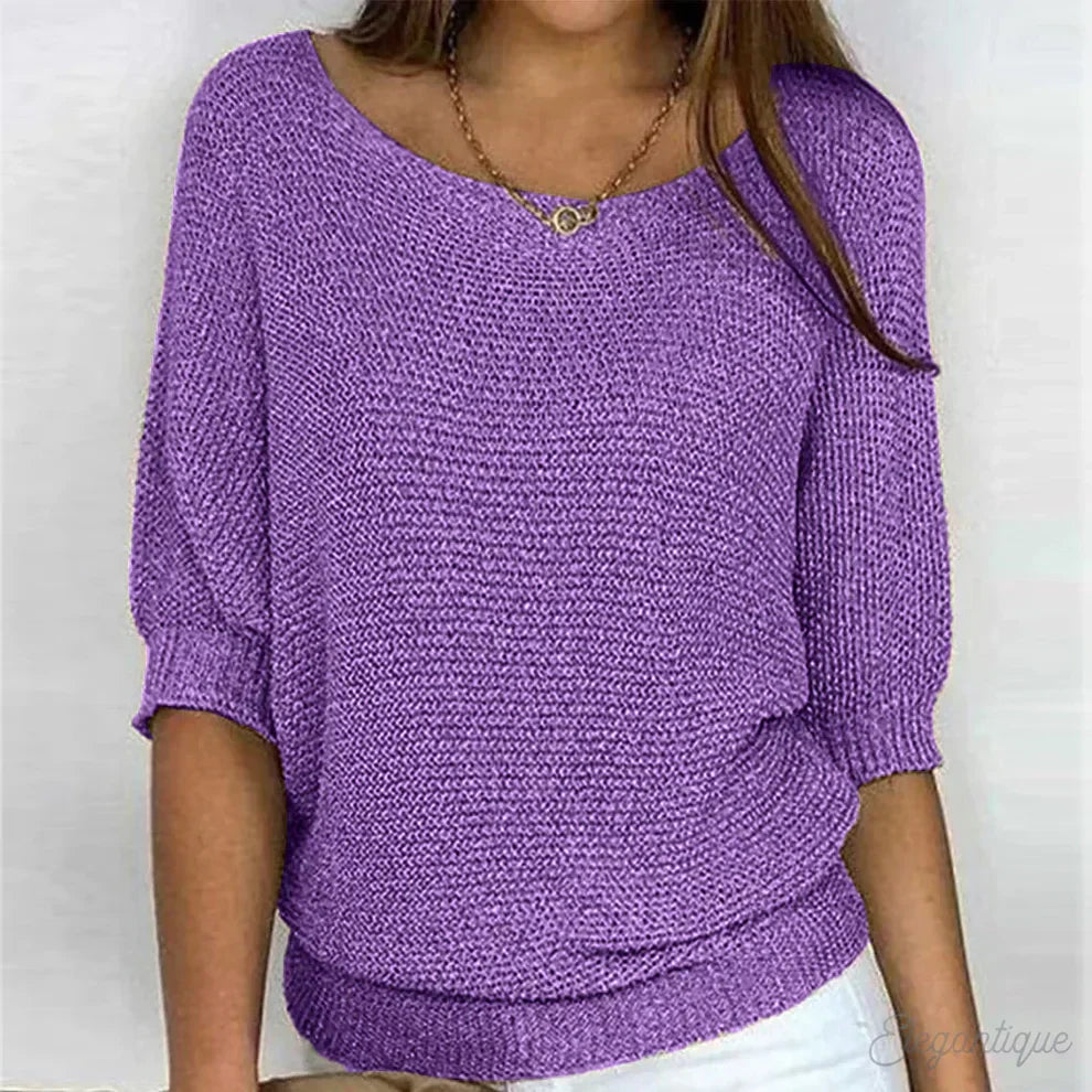 Women's textured knit sweater with wide round neck and three-quarter sleeves