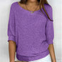 Women's textured knit sweater with wide round neck and three-quarter sleeves