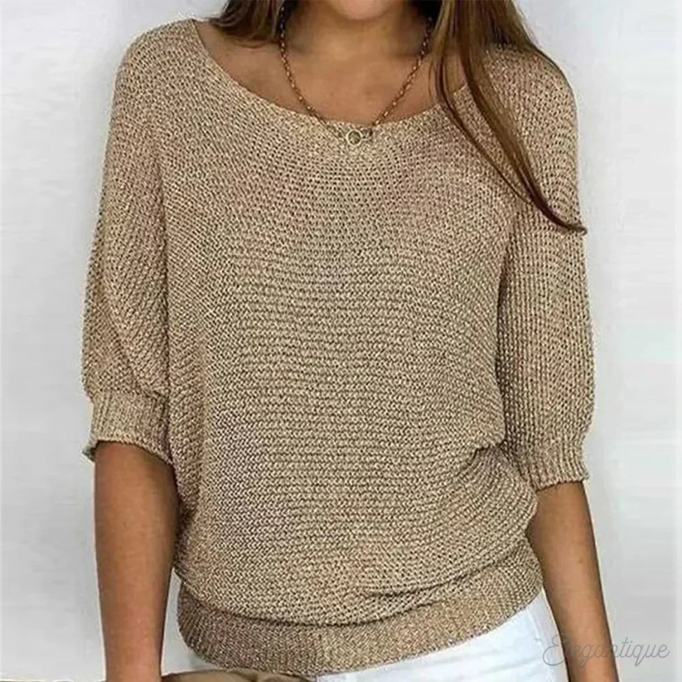 Women's textured knit sweater with wide round neck and three-quarter sleeves