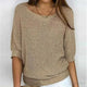 Women's textured knit sweater with wide round neck and three-quarter sleeves