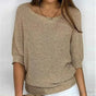 Women's textured knit sweater with wide round neck and three-quarter sleeves