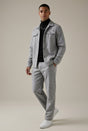 Men's two-piece jacket and straight-leg trousers set with button-front jacket