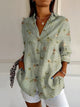 Women's Abstract Print Split-Neck Blouse — Button-Front Roll-Up Sleeve Casual Top
