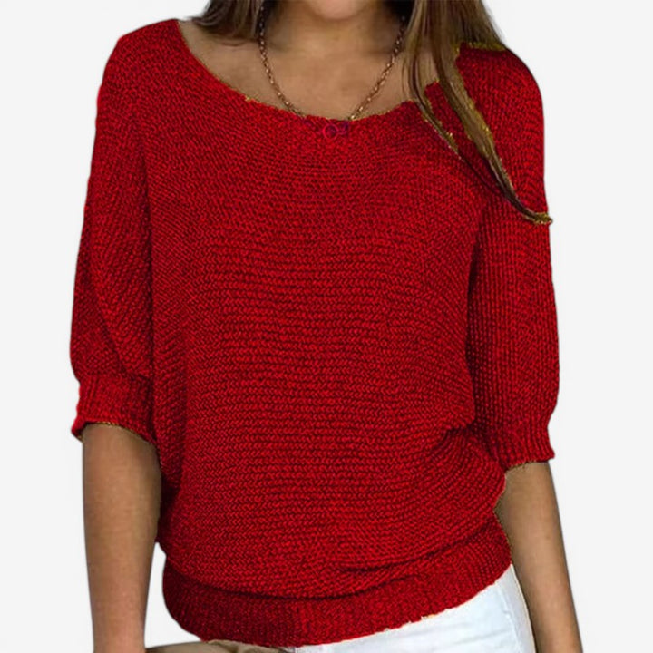 Women's textured knit sweater with round neck and three-quarter sleeves