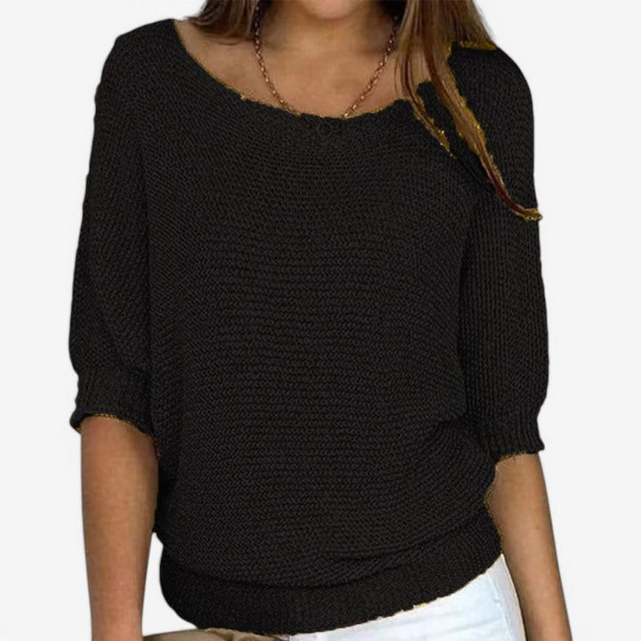 Women's textured knit sweater with round neck and three-quarter sleeves