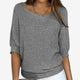 Women's textured knit sweater with round neck and three-quarter sleeves