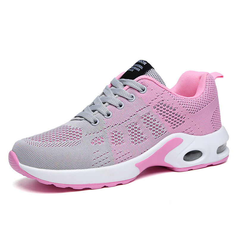 Women's low-top lace-up sneakers with textured panels and sculpted soles