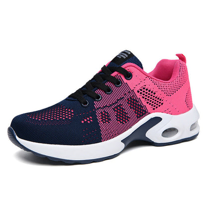 Women's low-top lace-up sneakers with textured panels and sculpted soles