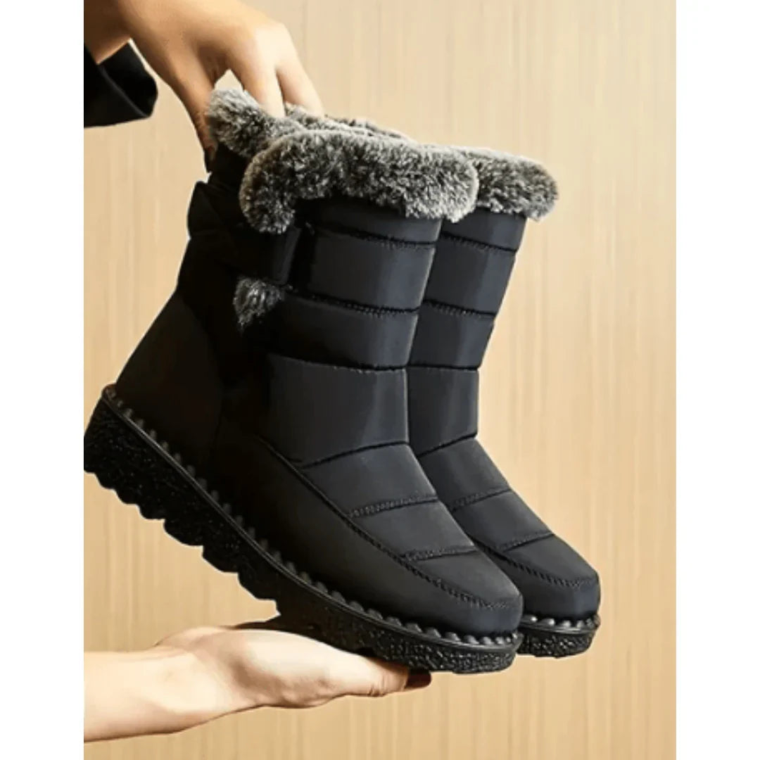 Quilted winter snow boots with faux fur trim and lugged soles