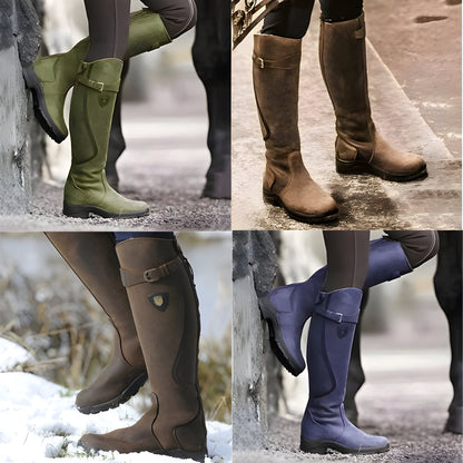 Tall women's riding boots with buckle straps, rounded toes and low heels