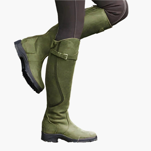 Tall women's riding boots with buckle straps, rounded toes and low heels