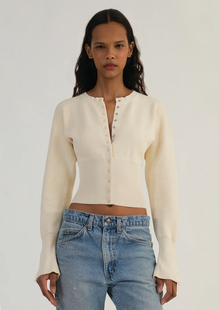 Women's cropped button-up cardigan with long sleeves