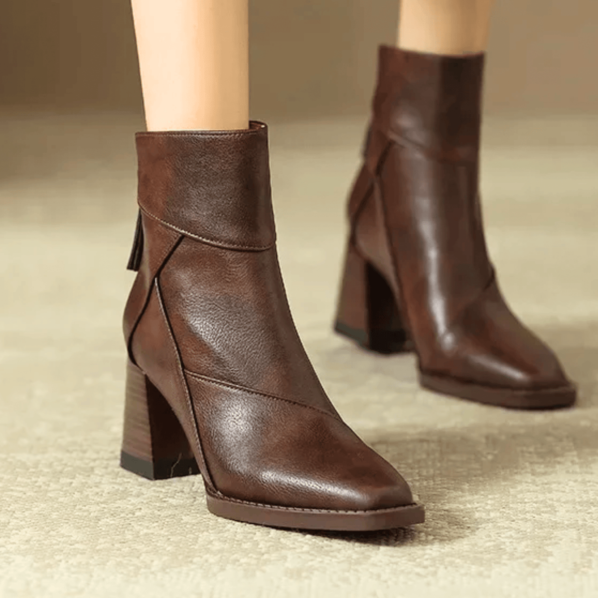 Pointed toe ankle boots with high block heels and side tassel detail