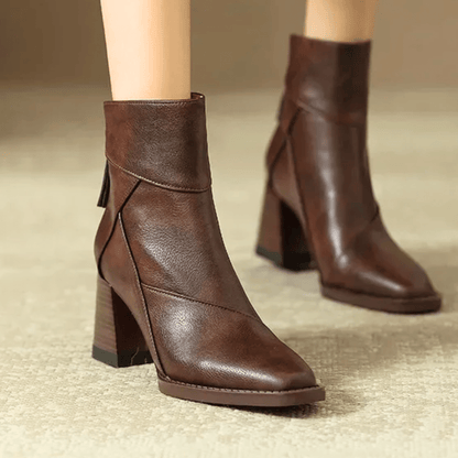 Pointed toe ankle boots with high block heels and side tassel detail