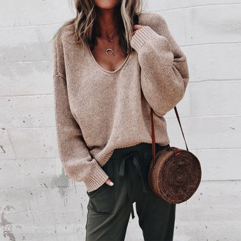 Women's textured V-neck knit sweater with long sleeves and ribbed trims
