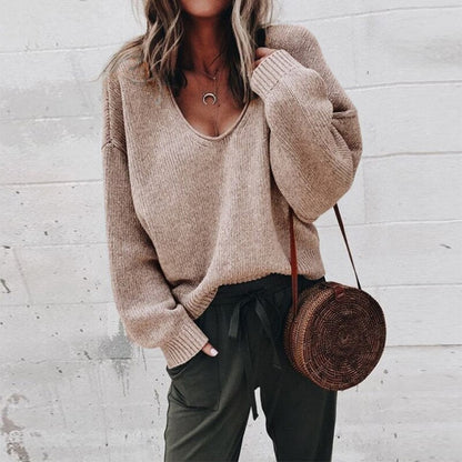 Women's textured V-neck knit sweater with long sleeves and ribbed trims