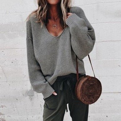 Women's textured V-neck knit sweater with long sleeves and ribbed trims