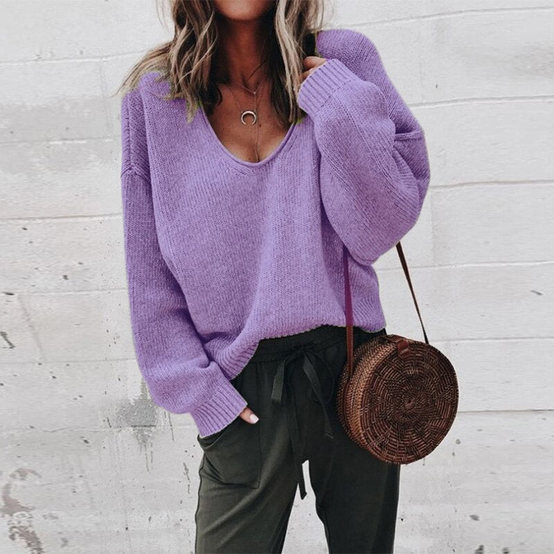 Women's textured V-neck knit sweater with long sleeves and ribbed trims